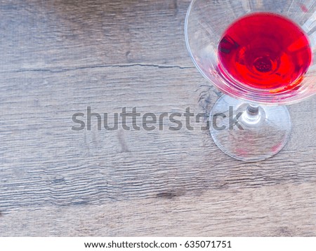 colored cocktails, martinis, on wooden background, space for text