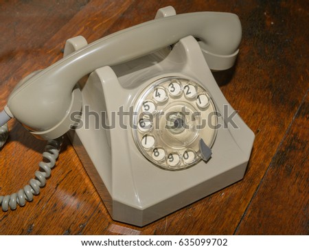 Old antique cell phone in grey