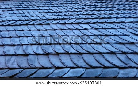 Roof shingle background. Blue overlapping pattern. Royalty-Free Stock Photo #635107301