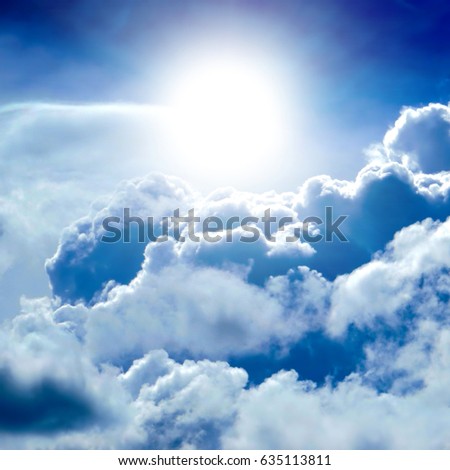 Dramatic Cloudscape Background with Sun and Blue Sky