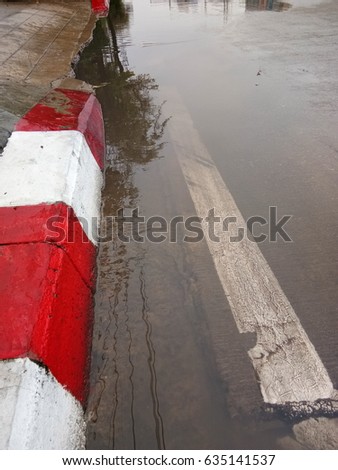 Flooding the road after rain