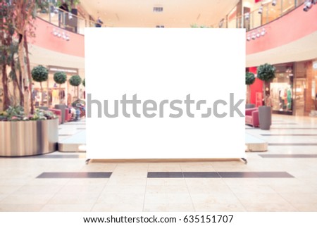 Mock up. Blank billboard, advertising stand in modern shopping mall Royalty-Free Stock Photo #635151707