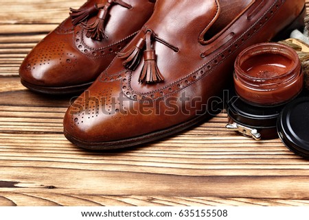 leather shoes brogues loafers with shoe maintenance set.Shoes care.copy space