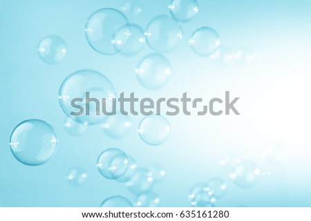 Blue soap bubbles background