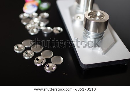 Pins press machine with empty pins and ready pins. Press button maker for 2,5 cm badge. Machine for DIY fashion button, pins and magnet