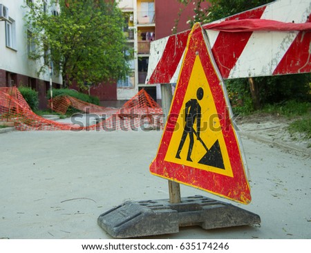 Road works and traffic signs.