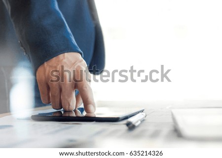 business man working on tablet with white copy space background