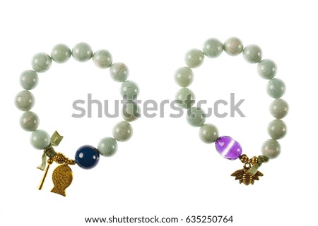 Picture of two pearl bracelets -isolated on white .