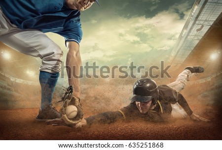 Baseball players in action on the stadium. Royalty-Free Stock Photo #635251868