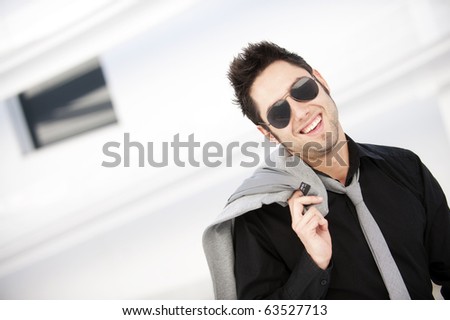 Attractive young man in urban and modern background