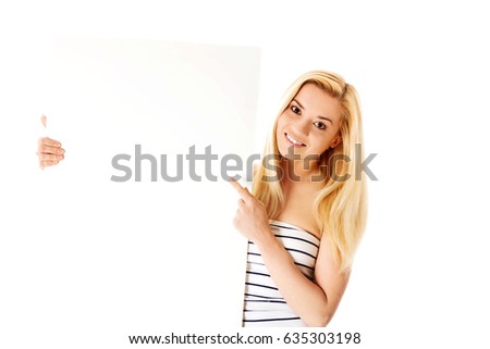 Portrait of young woman with blank white board, isolated on white.