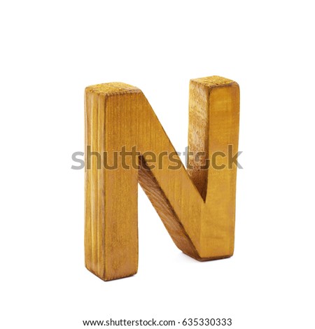 Single sawn wooden letter N symbol coated with paint isolated over the white background