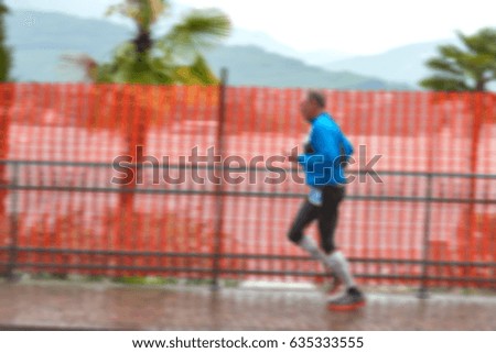 Picture blurred for background abstract and can be illustration Blurred background athletes running  during the Trail Marathon