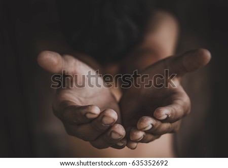 closeup hands poor child begging you for help concept for poverty or hunger people, Human Rights,background text.  Royalty-Free Stock Photo #635352692