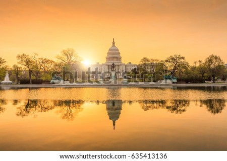 The United States Capitol building in Washington DC, sunrise Royalty-Free Stock Photo #635413136