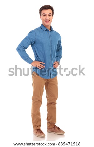 full body picture of a casual man with hands on waist on white background