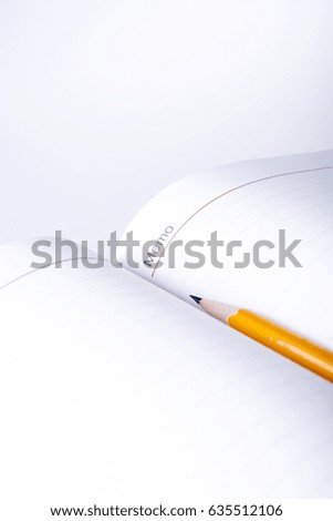 Pen above notes