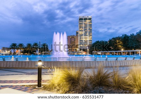 Jacksonville, Florida. City lights at night with fountain.