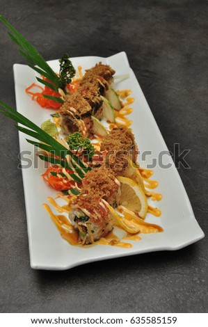 Fusion sushi dish on dark background