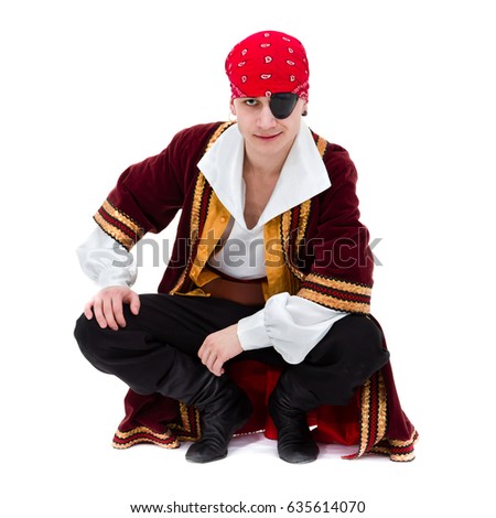 man wearing a pirate costume posing, isolated on white in full length.