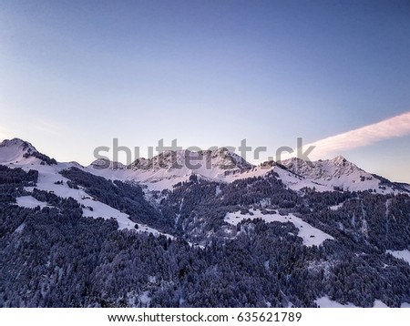 Spectacular sunset over landscape at European alps in winter