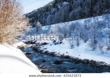 Swift river in winter, Austria