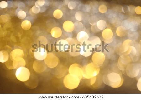 Abstract Golden Bokeh background with shining defocus sparkles. Blurred Glitter Dust Macro close up, copy space for text logo
