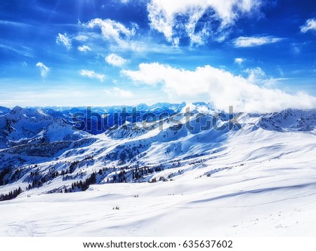 View of a snowy mountain landscape in the sunlight, Damuls Vorarlberg Austria