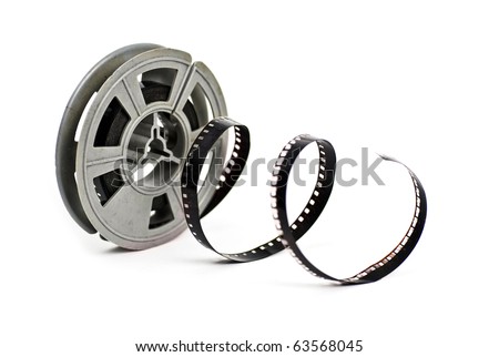still life of dirty, old 8mm cine film and reel; isolated on white ground