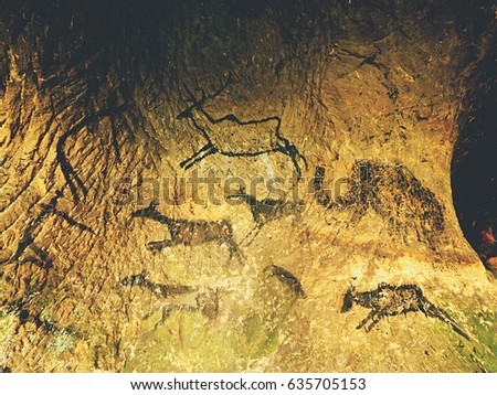 Paint of human hunting of deers, mammoth and reindeer. Historical black carbon abstract art in sandstone cave in poor light. Discovery of prehistoric paint of caveman hunt in sandstone cave. 