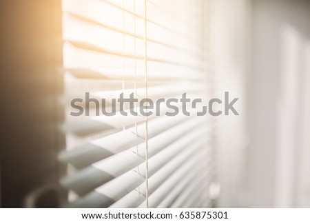 Modern plastic Shutter Jalousie in a room with sunlight Royalty-Free Stock Photo #635875301
