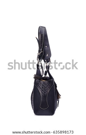 Leather ladies bag on a white background. Beautiful, fashionable, accessory, isolated. Interesting design, the texture of the skin. Comfortable handle.