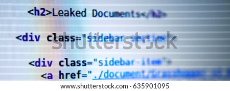 'Leaked documents' - real HTML code on computer screen, stylized, selective focus