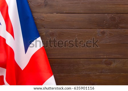 UK flag on wooden background.The place to advertise, template.