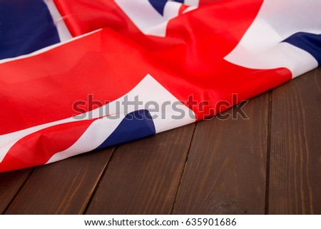 UK flag on wooden background.The place to advertise, template.