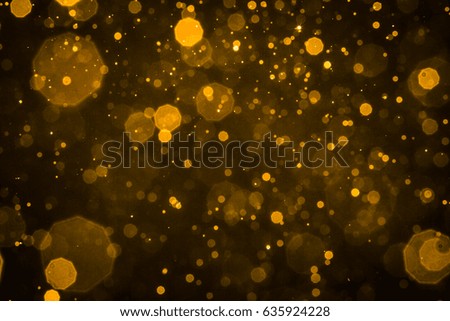Abstract blur gold sparkle bokeh background