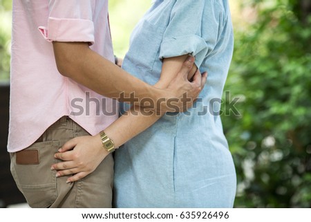 Young asian pregnant woman with husband handsome with vintage picture style cute lovely.