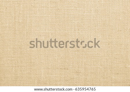Jute fabric sackcloth burlap texture background beige cream brown color Royalty-Free Stock Photo #635954765