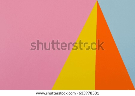 Yellow, blue, purple and orange color paper background. Top view