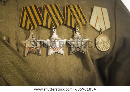 Different awards and medals on the russian army uniform.  Memory of awards and medals of World War II and Great Patriot War orders