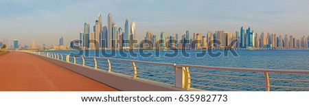Dubai - The evening panorama of Marina towers and the promenade of Palm Island.