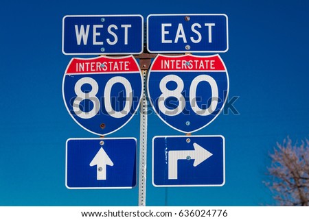 NEBRASKA - Interstate 80 East and West sign points to entrance to Interstate on ramp