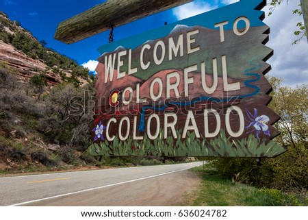 Welcome to Colorful Colorado State Road Sign near Utah/Colorado border going towards Norwood Colorado Royalty-Free Stock Photo #636024782