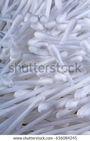 Cotton swabs ear cleaning or cosmetic tool as background texture pattern.