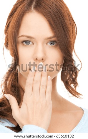 bright picture of pretty woman with hand over mouth