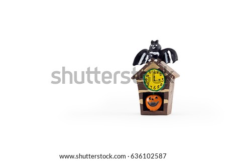 Clock with Pumpkin and Bat Doll on White Isolated. Left Copy Space for Text. Idea Concept for Halloween Background.