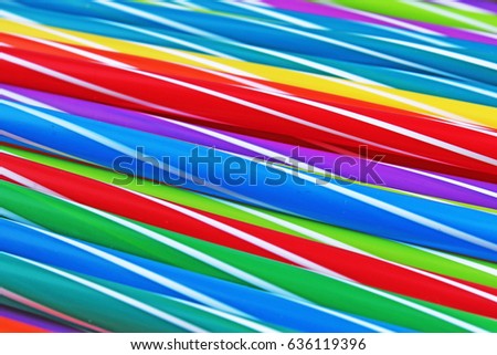 
Fancy straw art background. Abstract wallpaper of colored fancy straws. Rainbow colored colorful pattern texture.
