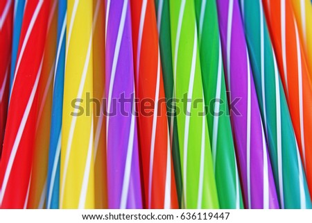 
Fancy straw art background. Abstract wallpaper of colored fancy straws. Rainbow colored colorful pattern texture.
