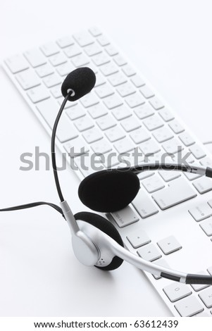 BUSINESS IMAGE headset on a white keyboard