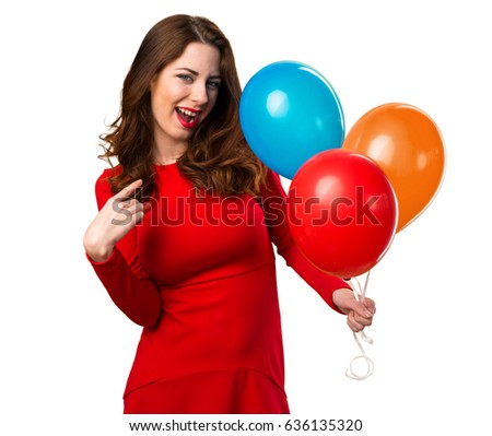 Beautiful young girl holding balloons and proud of herself